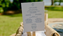 fan with program at wedding