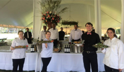 catering staff with serving trays