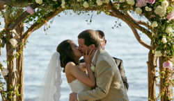 groom kissing bride