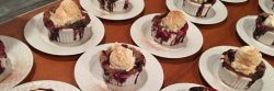 multiple mixed berry cobblers on table