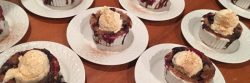 berry cobbler with ice cream on top