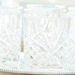 glassware on sliver serving tray