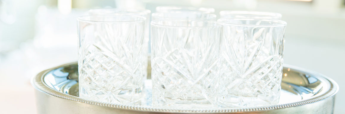 glassware on sliver serving tray