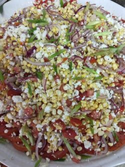 fresh corn, heirloom tomato, pickled onion, cotija cheese salad