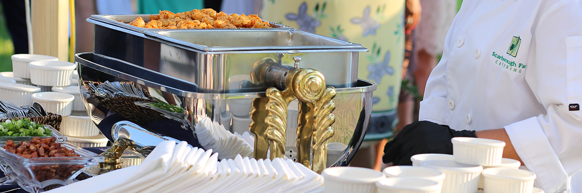 shrimp and grits station at wedding